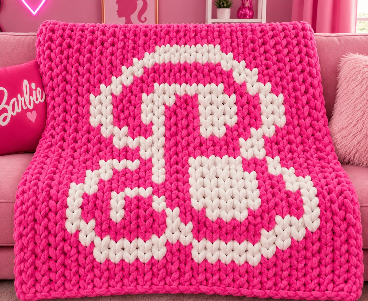 chunky knit blanket with a barbie inspired B