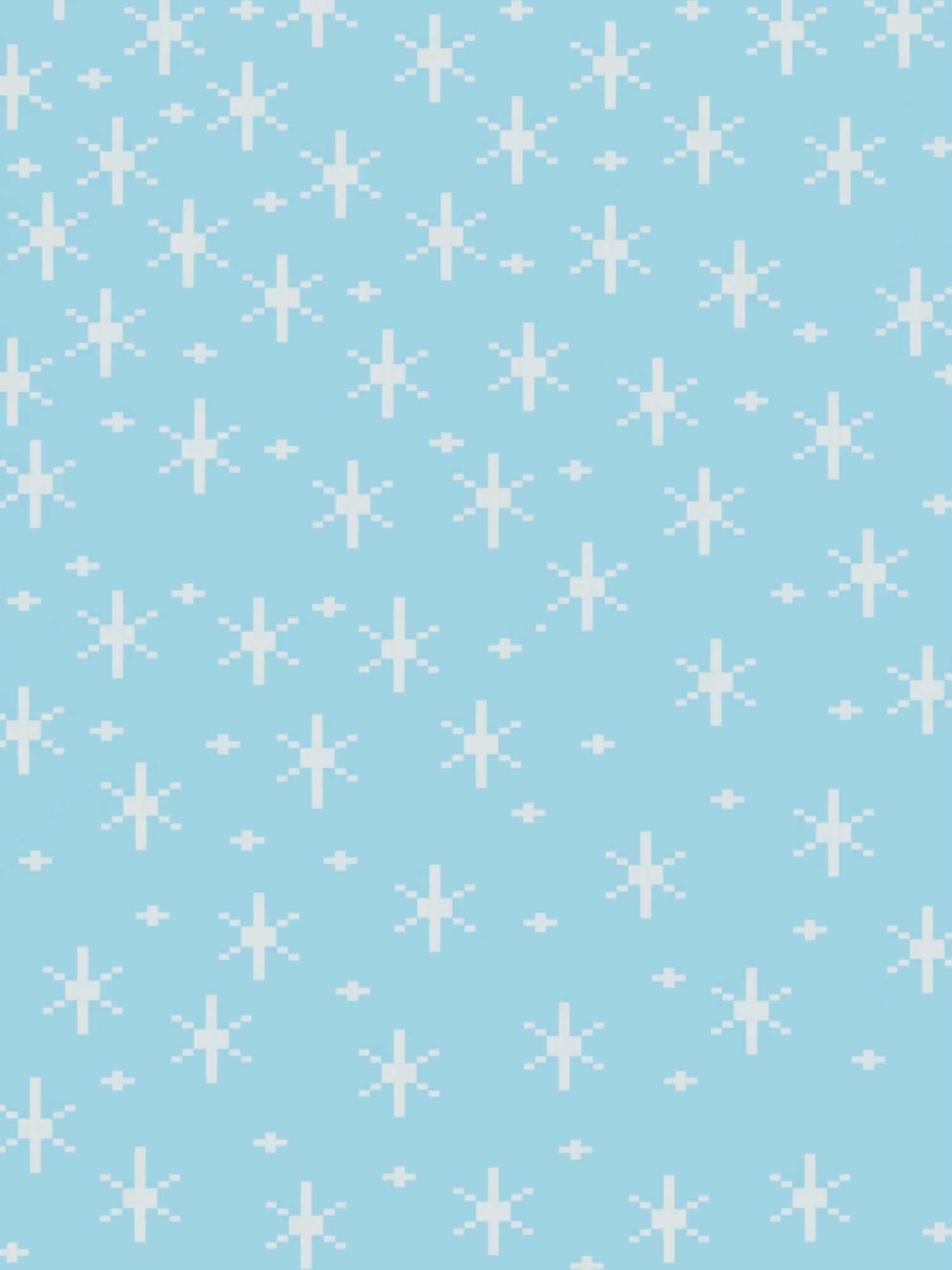 Pattern of white snowflakes on a light blue background