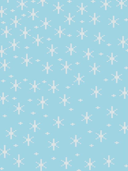 Pattern of white snowflakes on a light blue background