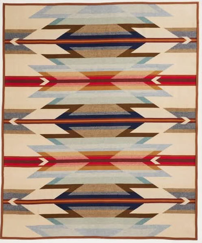 Geometric-patterned blanket with multicolor design on a beige background