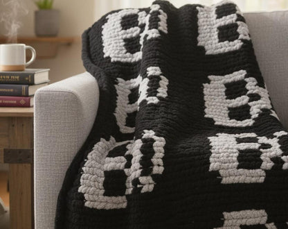 skull blanket draped over a large chair