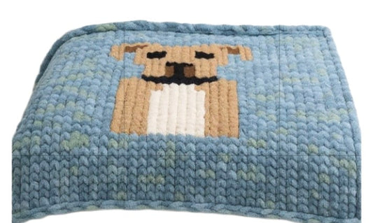 Blanket with a dog design on a blue background